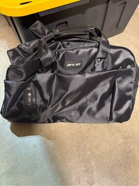 Zip’ N Jet 20” soft shell Suitcase